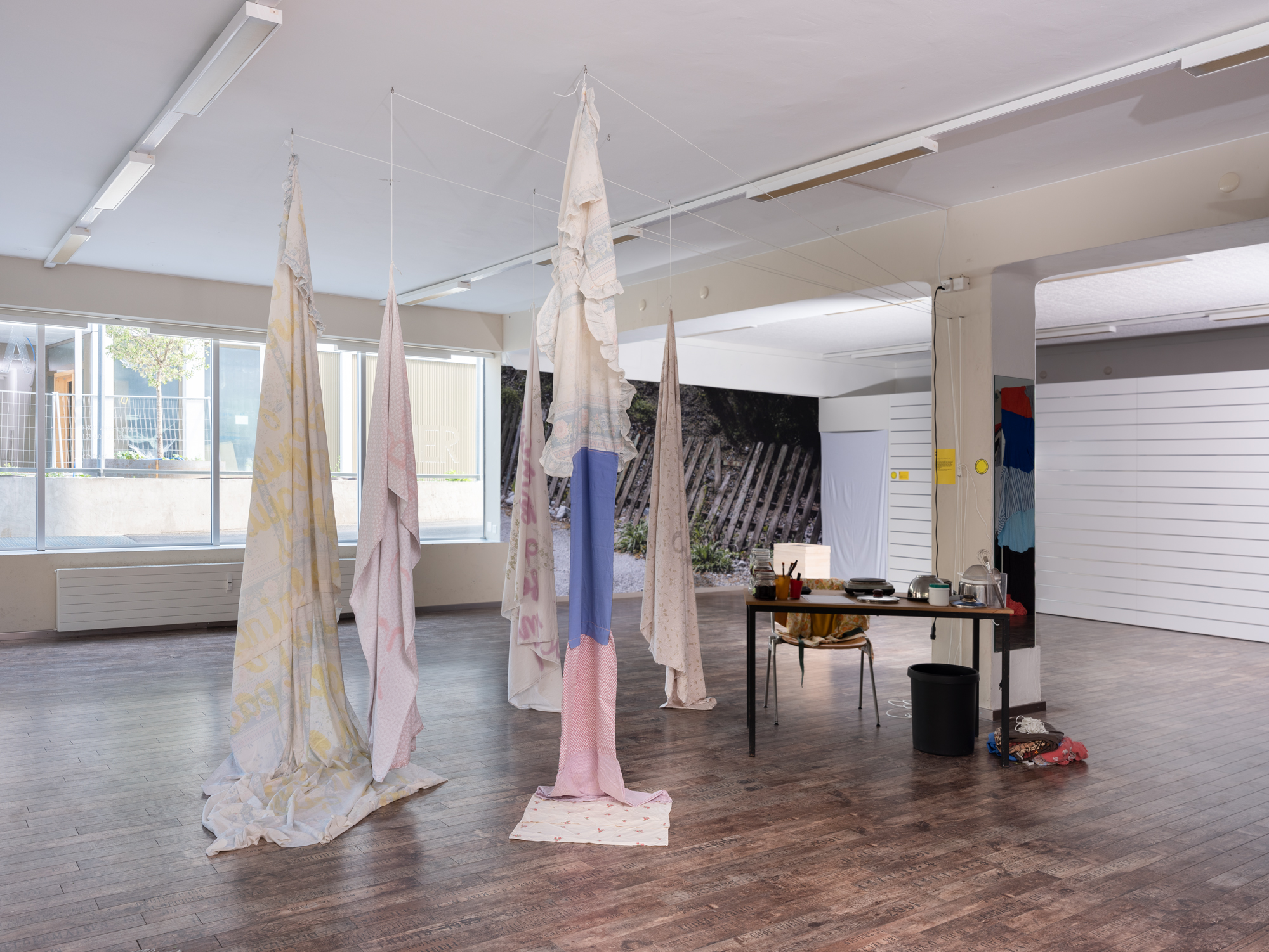 Vegetable-based ink on bed linen, loop video, ongoing performance, 2025, Sierre